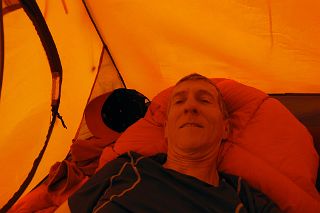 17 Jerome Ryan Resting In Tent Waiting For Clouds To Clear From K2 North Face At Intermediate Base Camp 4462m
